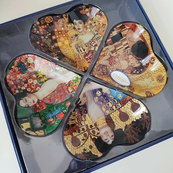 Komplet  dekoracyjnych talerzyków ozdobionych motywami z malarstwa Gustawa Klimta.webp