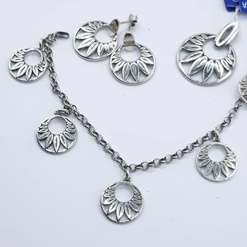 Biżuteria srebrna komplet kwiatki kolczyki bransoletka zawieszka.webp